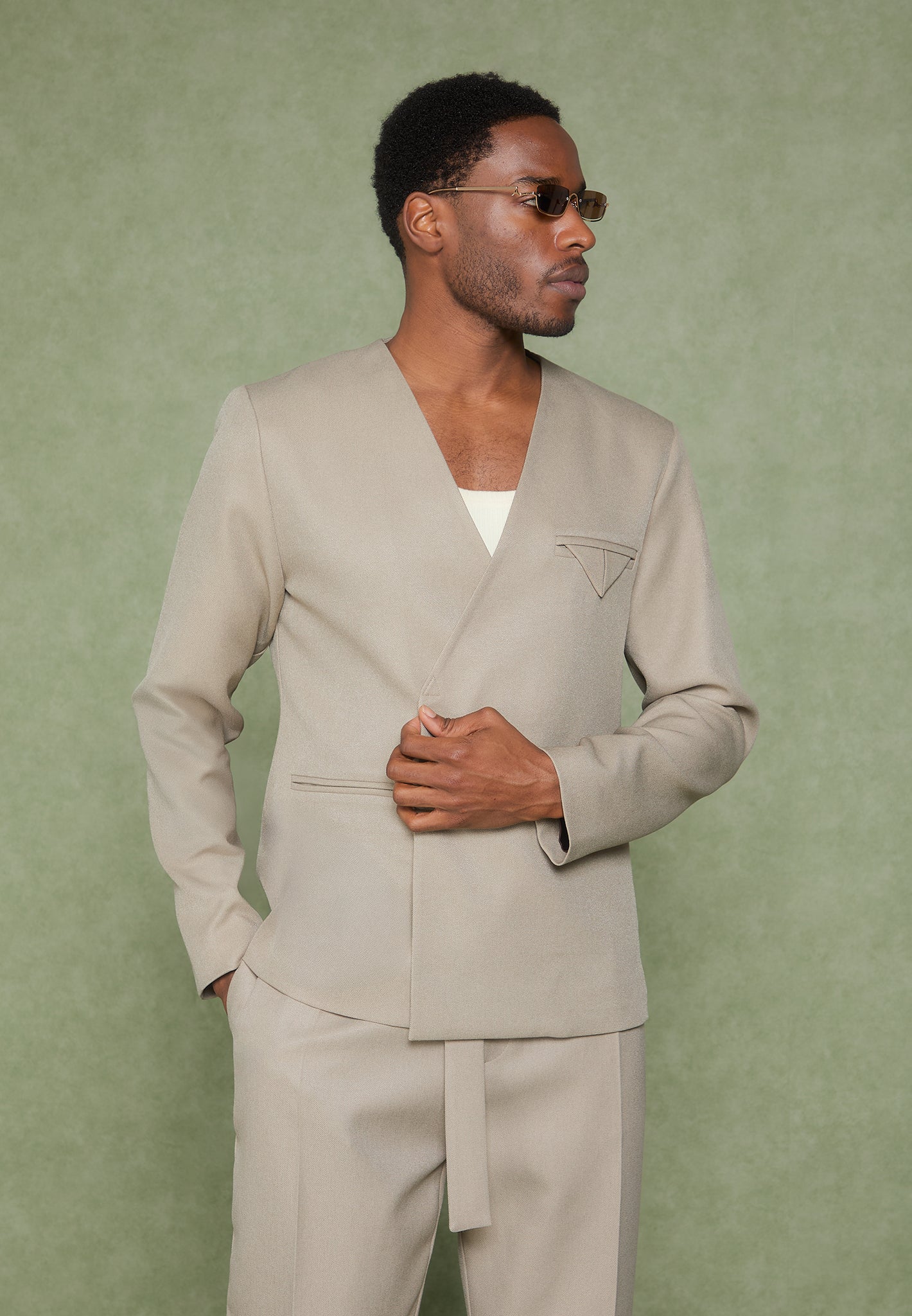 relaxed-fit-textured-belted-tailored-trousers-beige