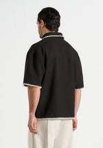 Lenny - Boxy Polo Shirt With Whipstitch Detail - Black