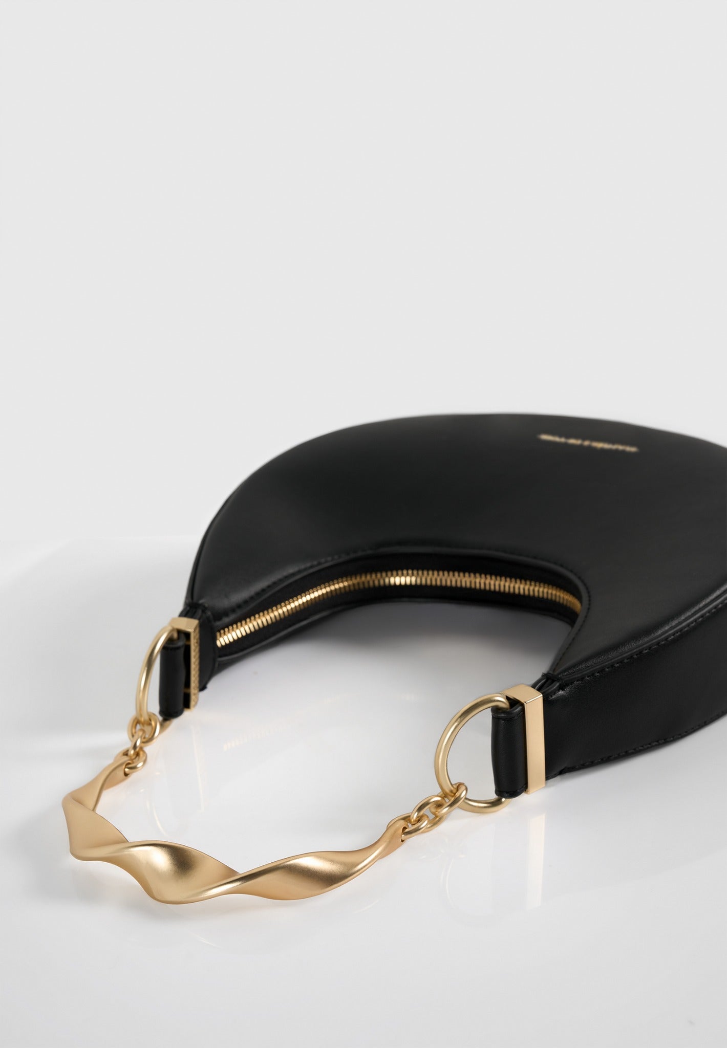 sadie-sculpted-leather-crescent-bag-black
