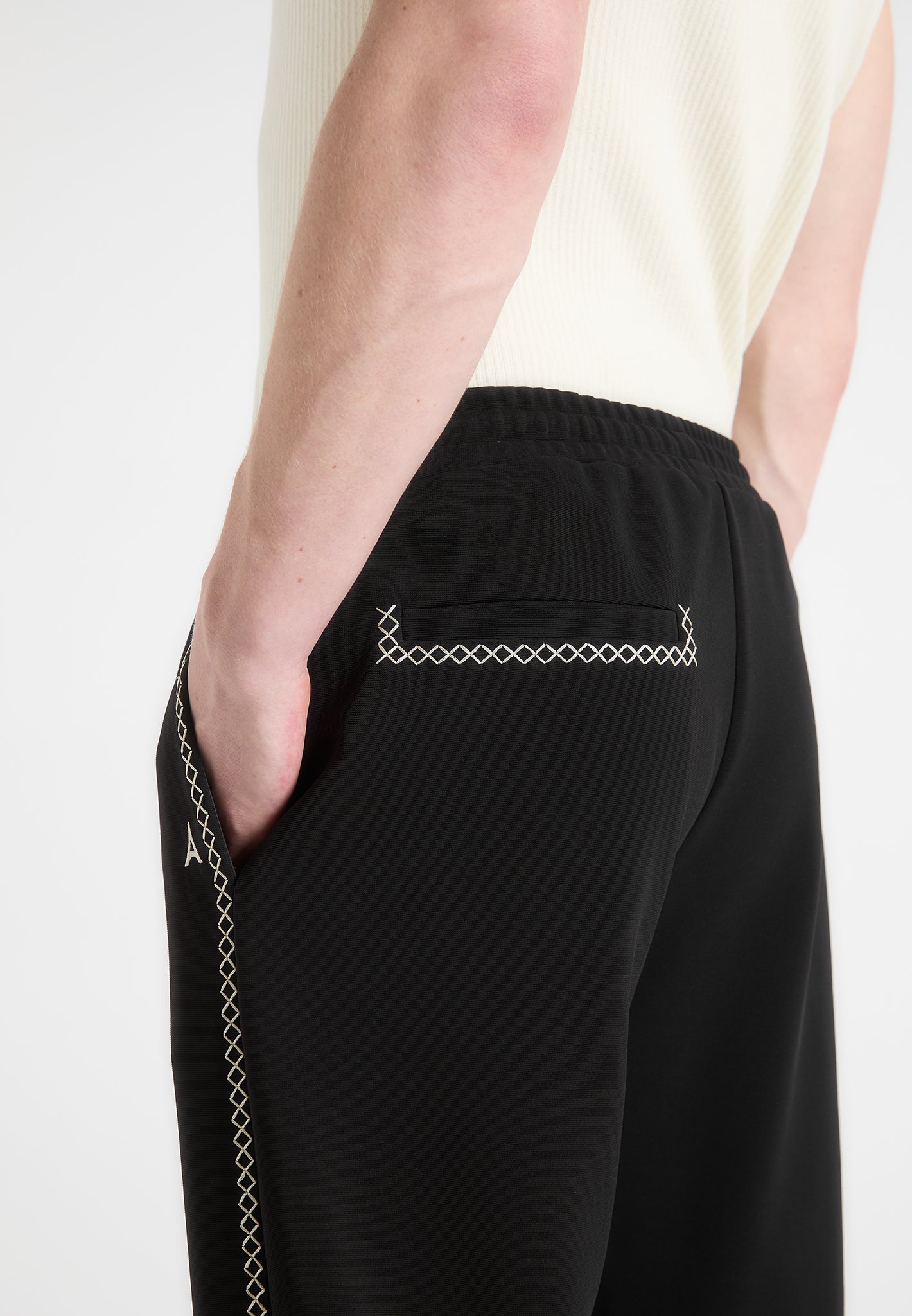 contrast-whipstitch-relaxed-track-pants-black