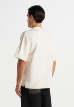 Ari - Unisex Signature Relaxed Fit Cotton T-Shirt - Cream