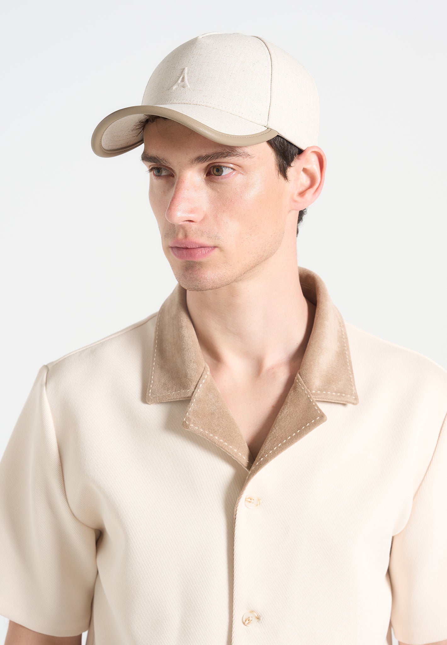 embossed-eiffel-cap-with-leather-trim-natural