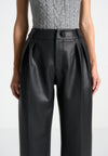 pebbled-leather-pleated-stacked-trousers-black