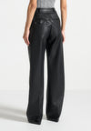 pebbled-leather-pleated-stacked-trousers-black