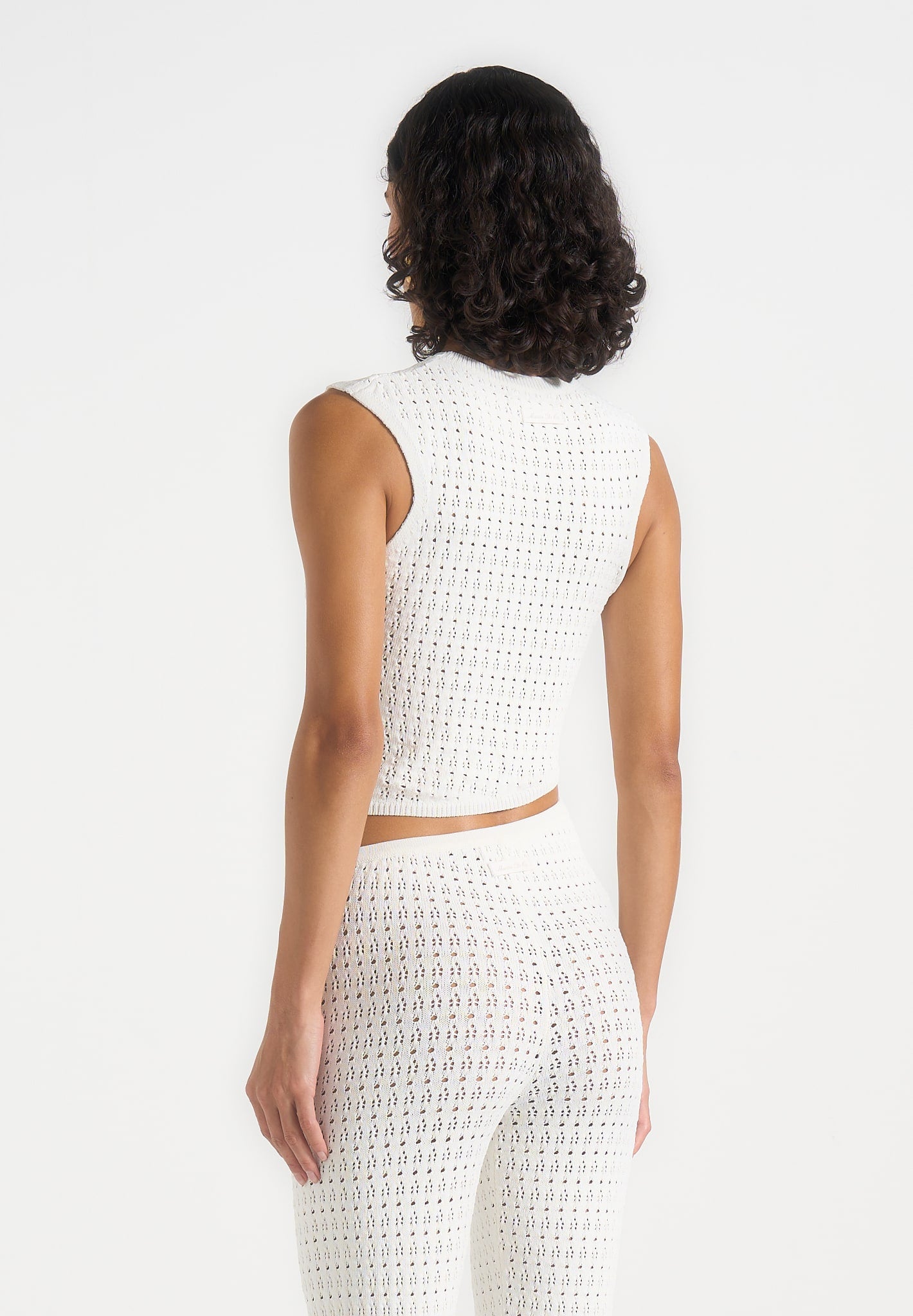 kelsey-pointelle-asymmetric-top-cream