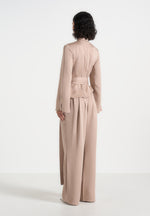 Aurore - Mock Neck Ring Belt Pleated Leg Jumpsuit - Beige