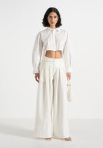 Flora - Box Pleat Wide Leg Belted Trousers - White