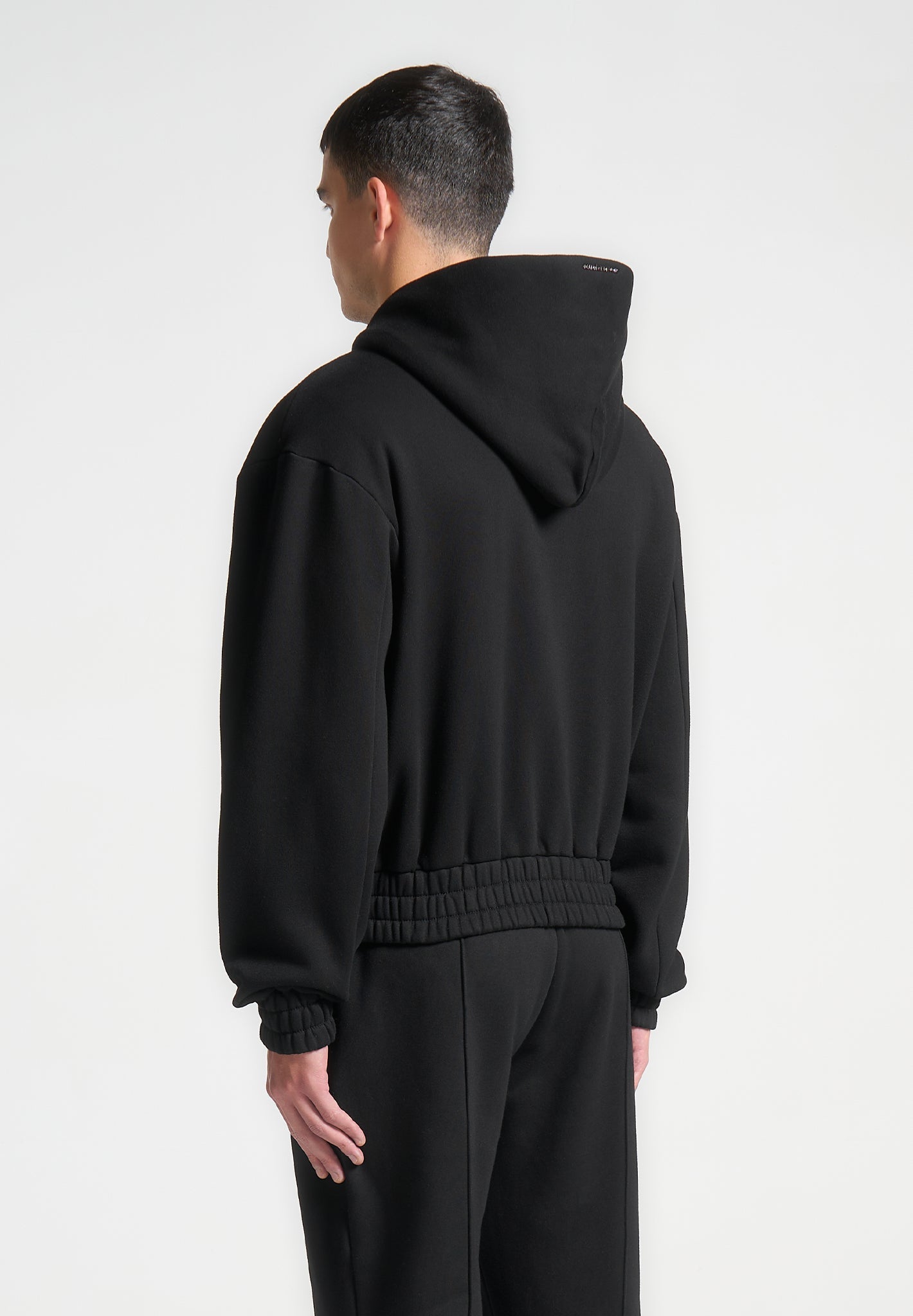 js006-embossed-zip-hoodie-black