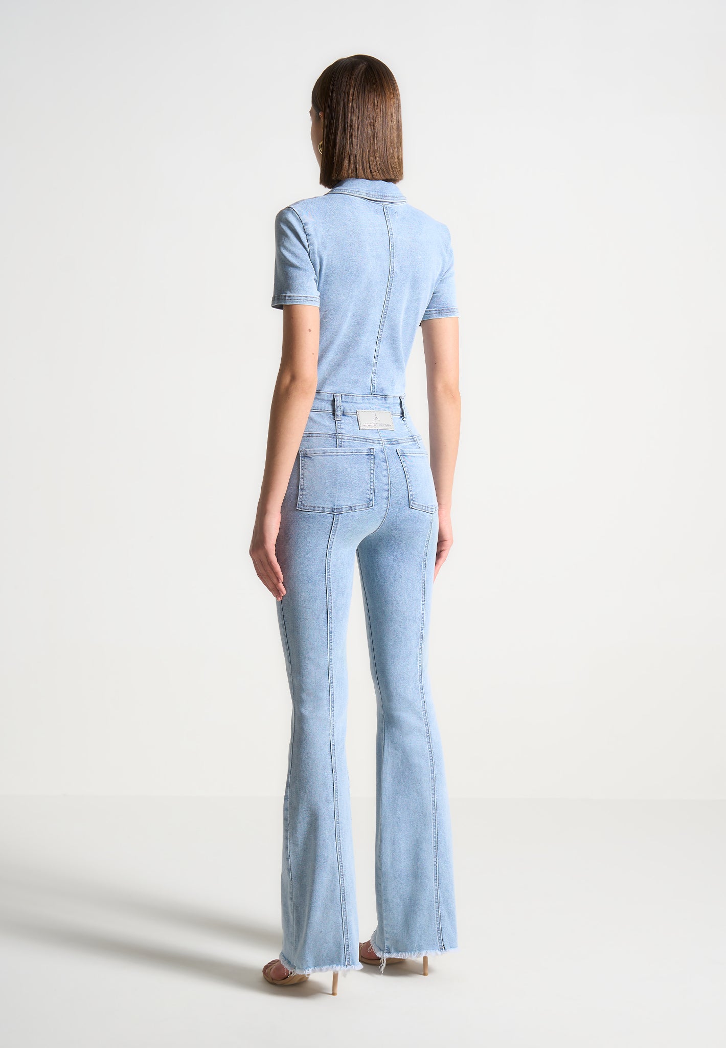 mini-flared-denim-jumpsuit-mid-blue