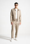 slim-fit-tailored-trousers-beige