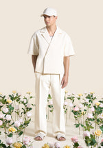 relaxed-fit-twill-pleated-tailored-trousers-cream