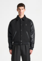 leather-raglan-varsity-jacket-black