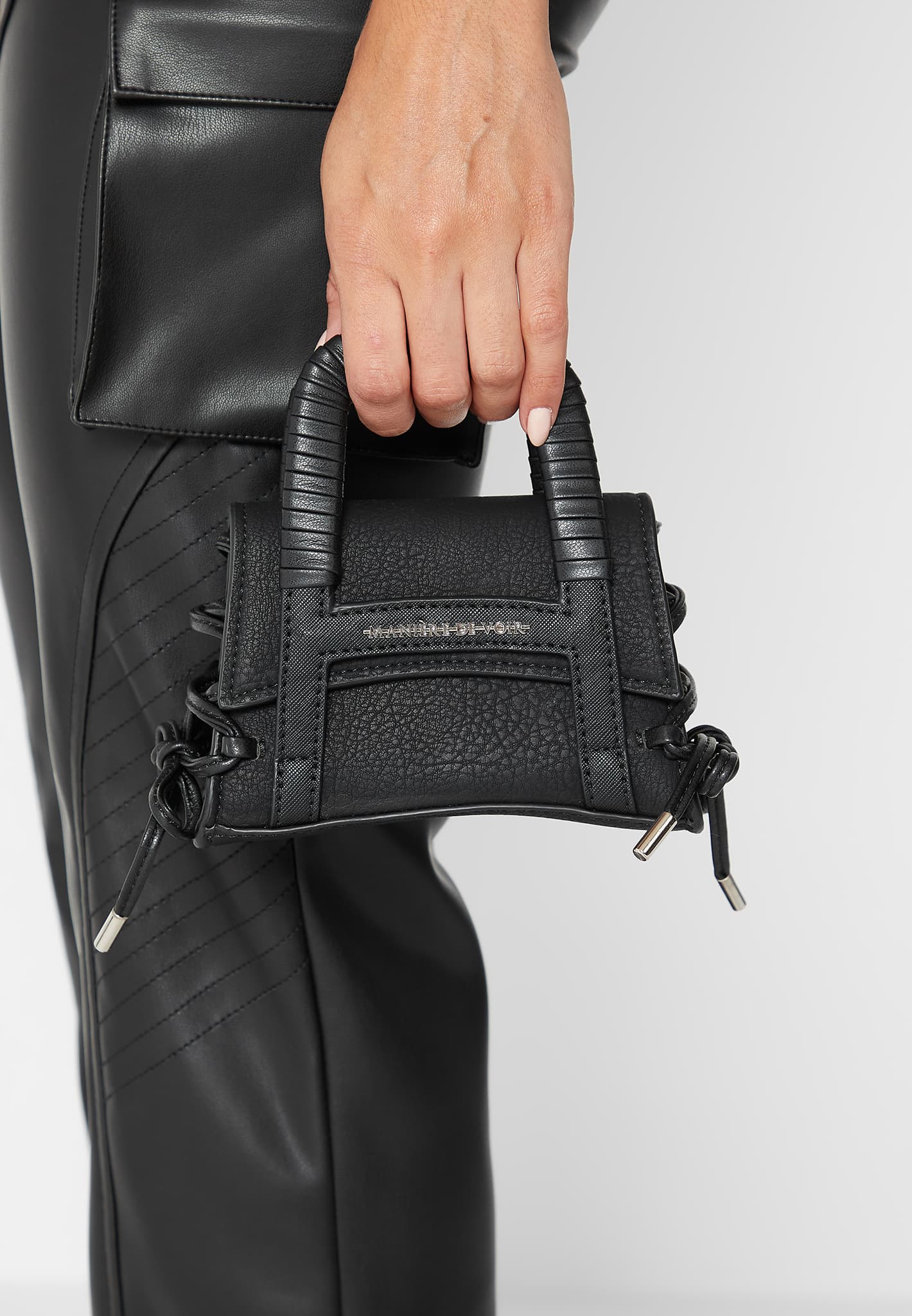 miniature-caged-vegan-leather-lace-up-bag-black