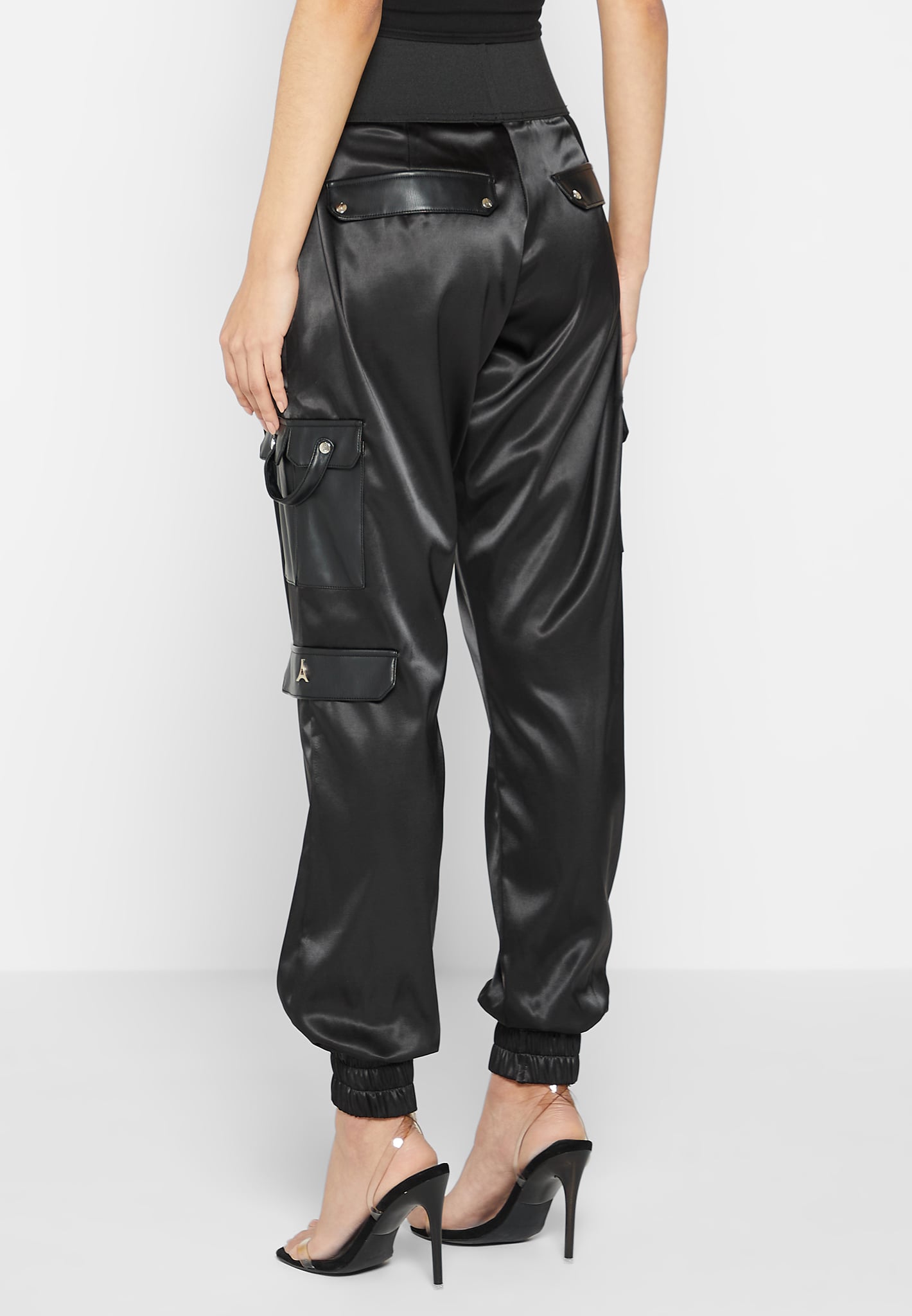 https://www.manieredevoir.com/cdn/shop/products/high-waisted-satin-cargo-trousers-black3.jpg?v=1685636244